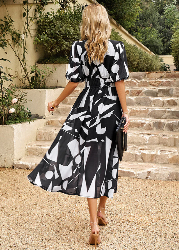 Estelle | Robe mi-longue à fleurs flatteuse