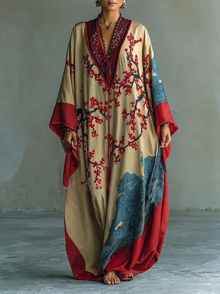 Lara | Robe longue d'été élégante avec motif floral et manches chauve-souris