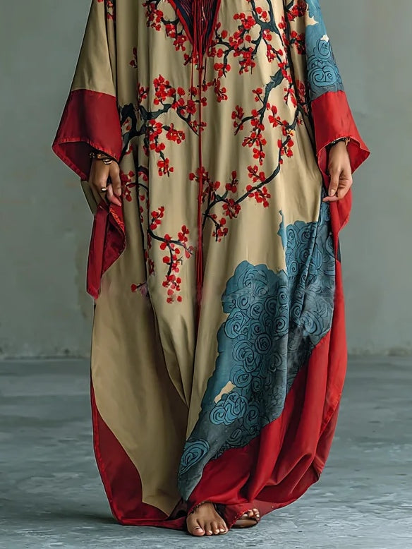 Lara | Robe longue d'été élégante avec motif floral et manches chauve-souris