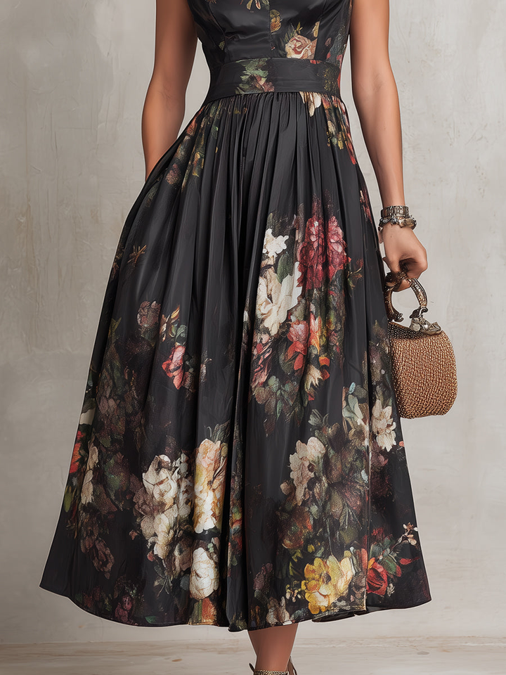 Violette | Robe midi plissée noire en satin avec motif floral et décolleté en forme d'oeil