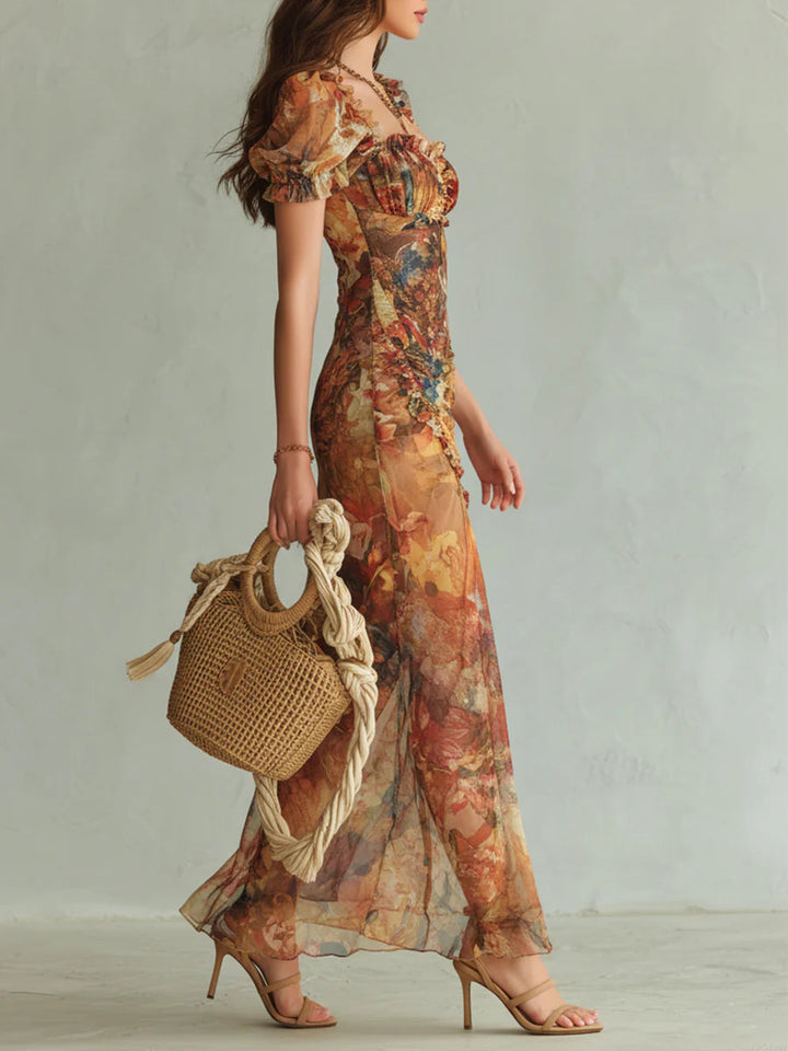 Alto | Robe longue en mousseline orange avec un motif bohème ressemblant à une peinture à l'huile
