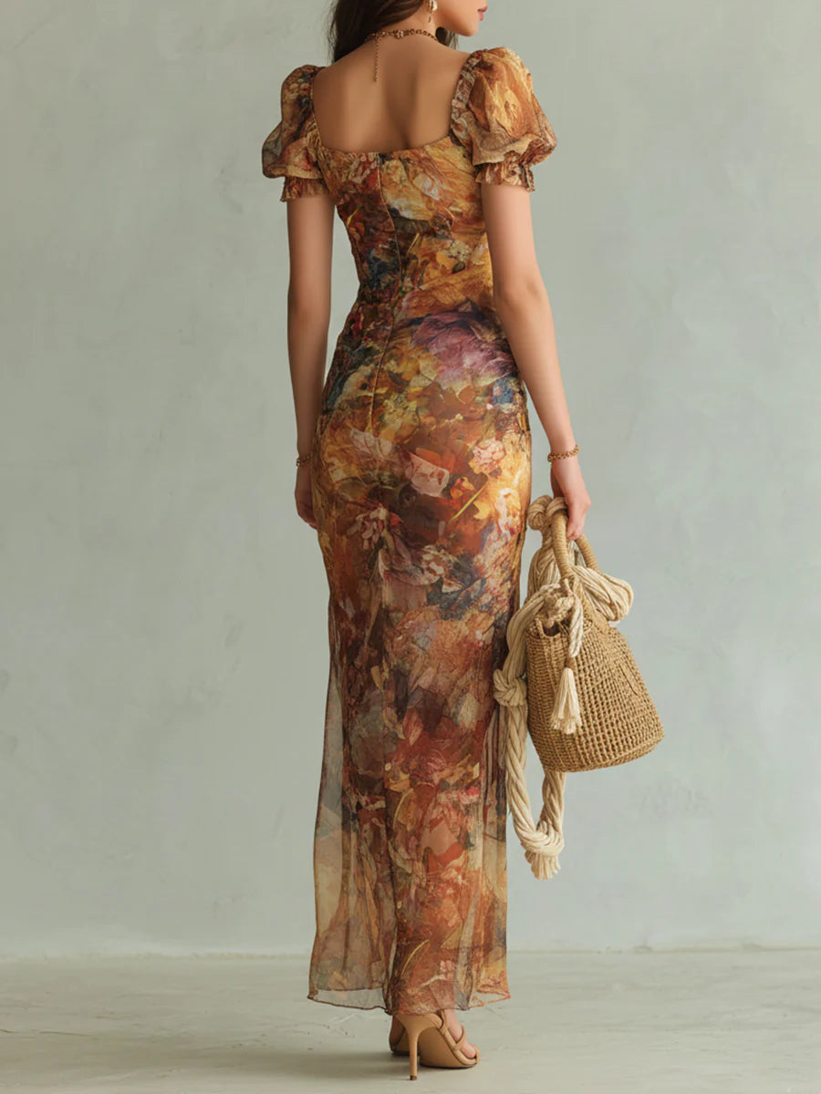 Alto | Robe longue en mousseline orange avec un motif bohème ressemblant à une peinture à l'huile
